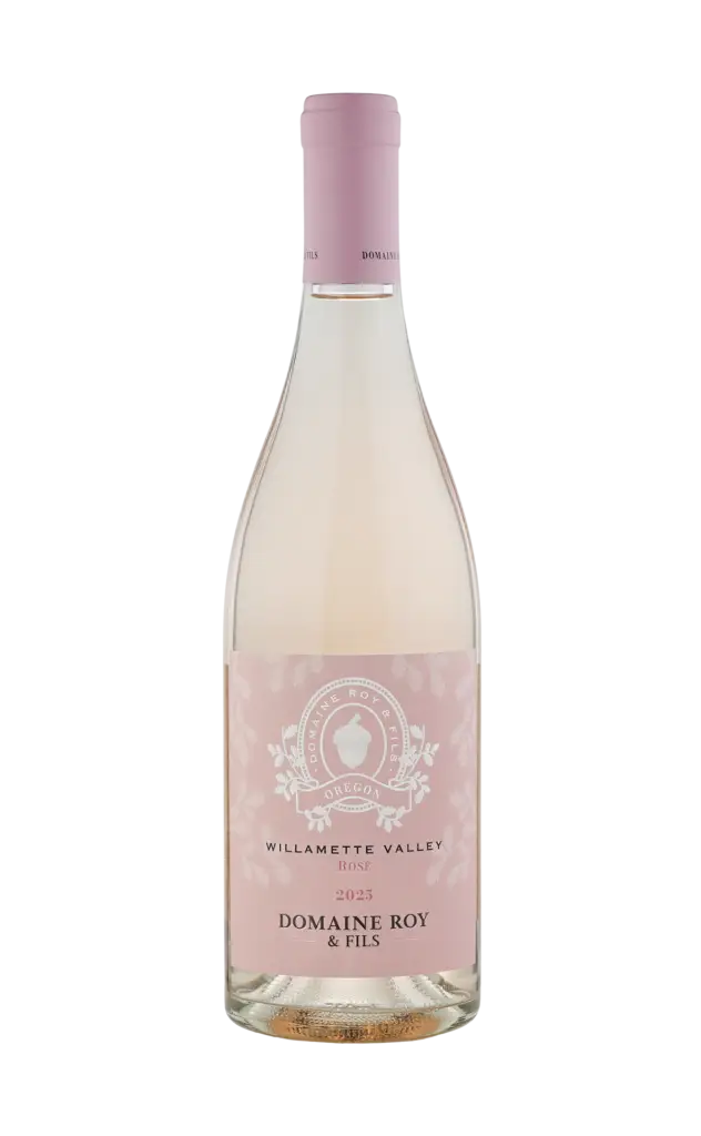 2025 Domaine Roy & Fils Willamette Valley Rosé wine bottle featuring a light pink label and a pink cap, showcasing its elegant design and Oregon origin.